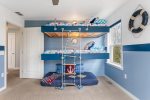 The Boy`s Room is Equally Inviting and Fun, Offering a Cozy Blues and a Bunk Bed for Restful Dreams